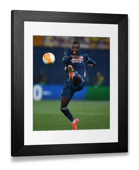 Framed Print : Behind Closed Doors: Arsenal's Nicolas Pepe Faces Villarreal in UEFA Europa League Semi-Final (2020-21)