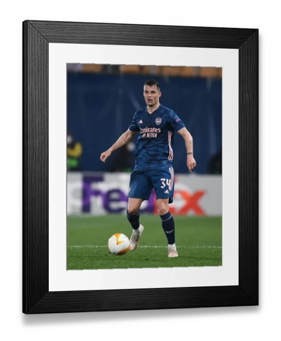 Framed Print : Arsenal's Granit Xhaka in UEFA Europa League Semi-Final Action Against Villarreal