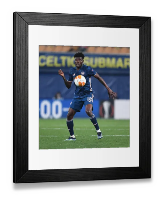Framed Print : Thomas Partey in Action: Arsenal vs. Villarreal, UEFA Europa League Semi-Final Leg One (Behind Closed Doors)