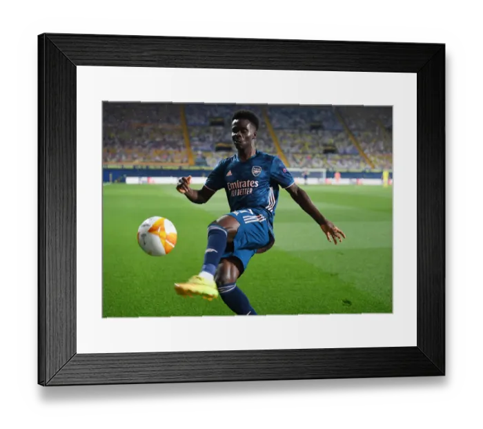 Framed Print : Bukayo Saka Leads Arsenal in Europa League Semi-final Against Villarreal, Spain (2020-21): A Lone Warrior Amidst Empty Stands
