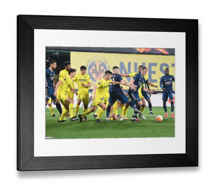 Framed Print : Arsenal Defenders Hold Off Villarreal in Empty Europa League Semi-Final Framed Print : Arsenal Defenders Hold Off Villarreal in Empty Europa League Semi-Final