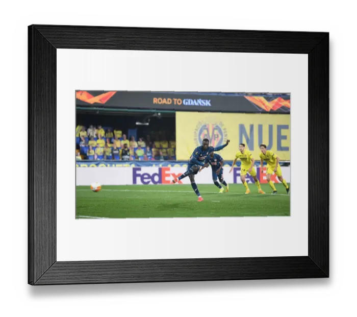 Framed Print : Pepe Scores Penalty: Arsenal Takes Early Lead in Europa League Semi-Final vs. Villarreal