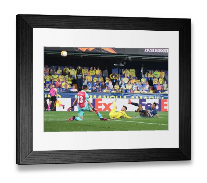 Framed Print : Behind Closed Doors: Aubameyang's Saved Shot - Arsenal vs. Villarreal in UEFA Europa League Semi-Final: Aubameyang's Dramatic Miss as Arsenal Battle Villarreal in Empty Stadiums Framed Print : Behind Closed Doors: Aubameyang's Saved Shot - Arsenal vs. Villarreal in UEFA Europa League Semi-Final: Aubameyang's Dramatic Miss as Arsenal Battle Villarreal in Empty Stadiums