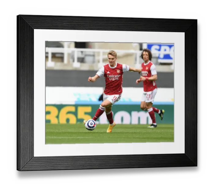 Framed Print : Odegaard Plays Out Empty St. James Park Duel: Arsenal vs. Newcastle (2020-21 Premier League)