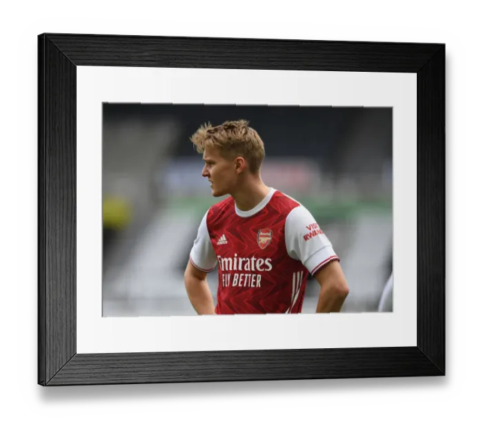 Framed Print : Arsenal's Odegaard Plays Newcastle in Empty St. James Park (2020-21 Premier League) Framed Print : Arsenal's Odegaard Plays Newcastle in Empty St. James Park (2020-21 Premier League)