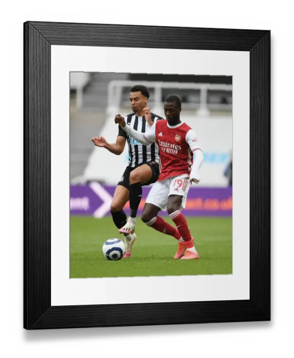 Framed Print : Pepe vs Murphy: Empty St. James Park Battle (Premier League 2021)