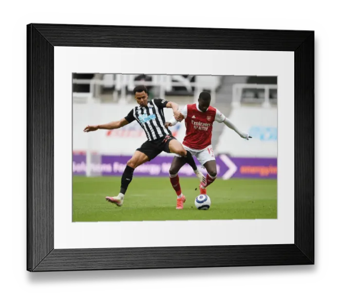 Framed Print : Pepe vs Murphy: Arsenal's Battle at Empty St. James Park Against Newcastle United (Newcastle United vs Arsenal, 2021-22 Premier League) Framed Print : Pepe vs Murphy: Arsenal's Battle at Empty St. James Park Against Newcastle United (Newcastle United vs Arsenal, 2021-22 Premier League)