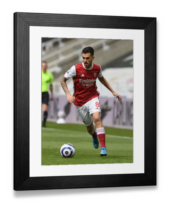 Framed Print : Arsenal's Dani Ceballos at Empty St. James Park: A Premier League Battle Against Newcastle United (2020-21)