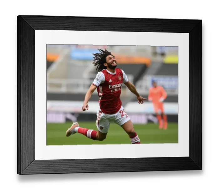 Framed Print : Elneny Scores the Winner: Arsenal Triumph Over Newcastle in Empty St. James Park