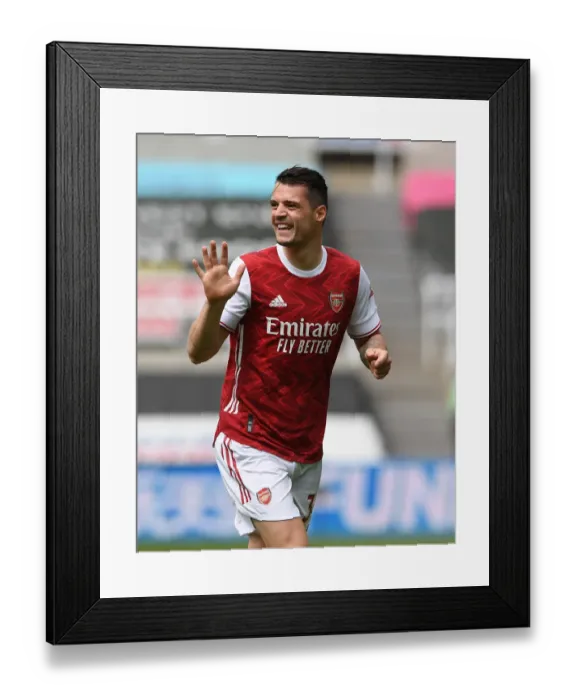 Framed Print : Granit Xhaka in Action: Arsenal vs. Newcastle United, Premier League 2020-21 (Behind Closed Doors) Framed Print : Granit Xhaka in Action: Arsenal vs. Newcastle United, Premier League 2020-21 (Behind Closed Doors)