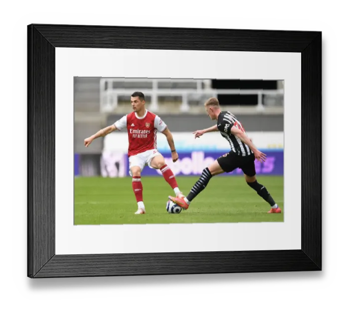 Framed Print : Xhaka vs Longstaff: A Battle in Empty St. James Park - Newcastle United vs Arsenal, Premier League 2021 Framed Print : Xhaka vs Longstaff: A Battle in Empty St. James Park - Newcastle United vs Arsenal, Premier League 2021