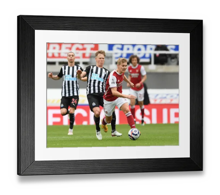 Framed Print : Empty Battle: Odegaard vs Ritchie, Arsenal vs Newcastle, Premier League 2021 (Behind Closed Doors)