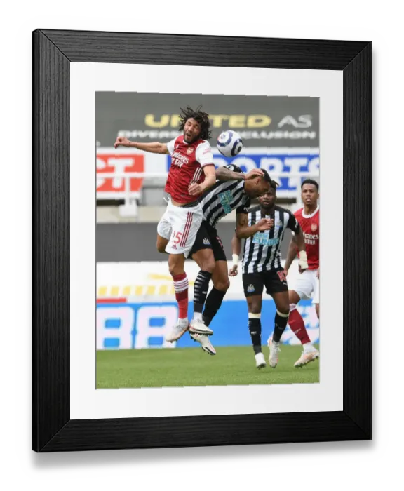 Framed Print : Elneny vs Wilson: A Battle in Empty St. James Park - Newcastle United vs Arsenal, Premier League 2021