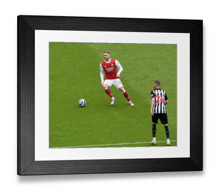 Framed Print : Arsenal's Calum Chambers at Empty St. James Park during Newcastle United Clash (2020-21)