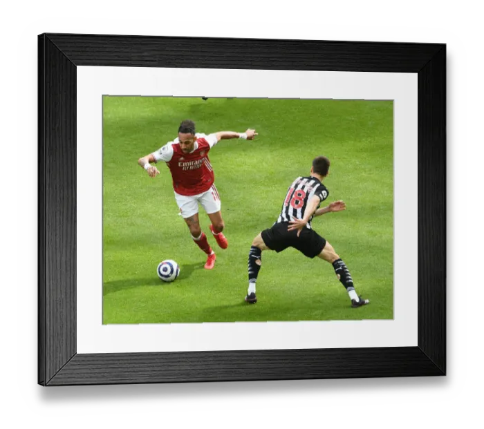 Framed Print : Arsenal's Aubameyang Faces Newcastle's Fernandez in Empty St. James Park (Newcastle United vs Arsenal, 2021-22 Premier League) Framed Print : Arsenal's Aubameyang Faces Newcastle's Fernandez in Empty St. James Park (Newcastle United vs Arsenal, 2021-22 Premier League)