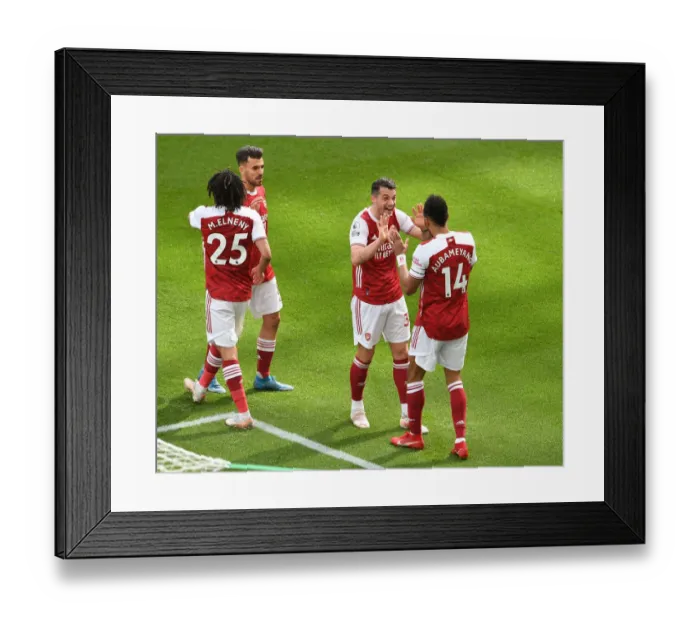 Framed Print : Aubameyang's Brace: Arsenal Secures Victory Over Newcastle in Empty St. James Park