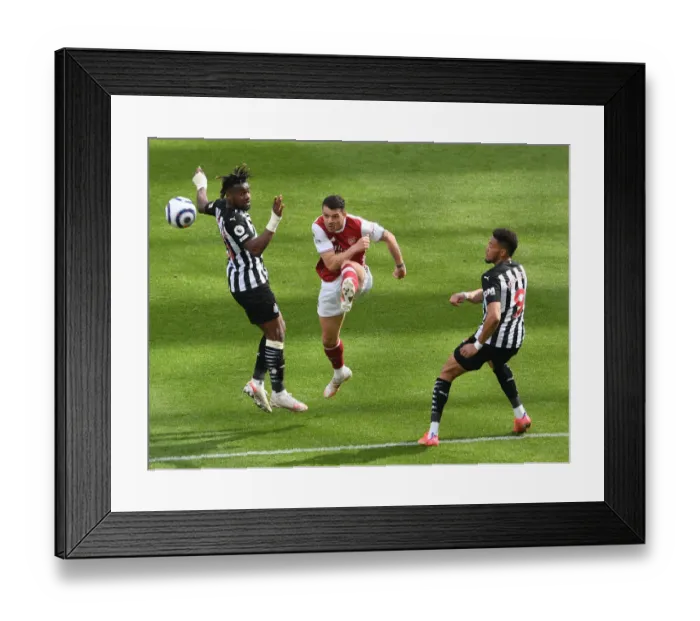 Framed Print : Xhaka Fends Off Newcastle Threats: Arsenal vs. Newcastle United, Premier League 2021 (Behind Closed Doors)