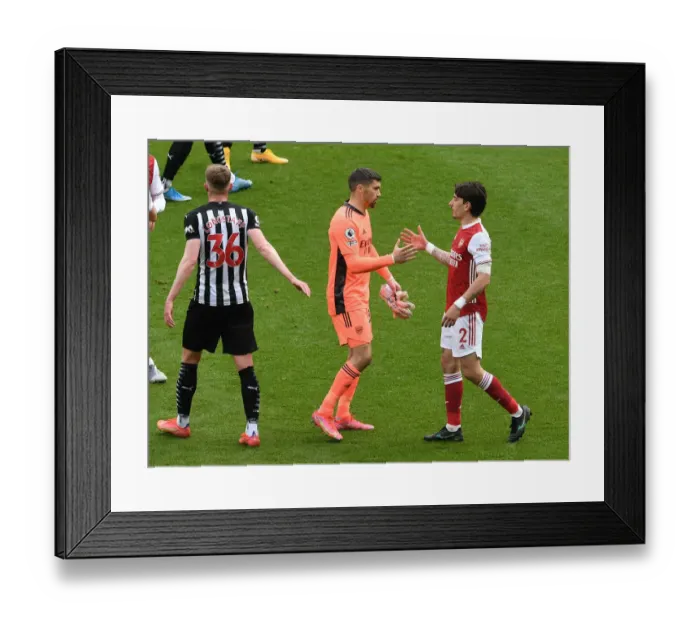 Framed Print : Arsenal Celebrate Win Against Newcastle United in Empty St. James Park Framed Print : Arsenal Celebrate Win Against Newcastle United in Empty St. James Park