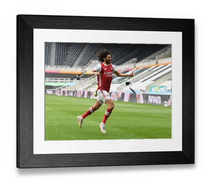 Framed Print : Mohamed Elneny Scores the Winner: Arsenal Triumph Over Newcastle in Empty St. James Park Framed Print : Mohamed Elneny Scores the Winner: Arsenal Triumph Over Newcastle in Empty St. James Park