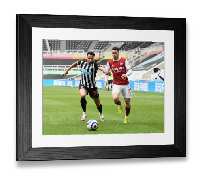 Framed Print : Martinelli vs Murphy: Battle at Empty St. James Park (Premier League 2021) Framed Print : Martinelli vs Murphy: Battle at Empty St. James Park (Premier League 2021)