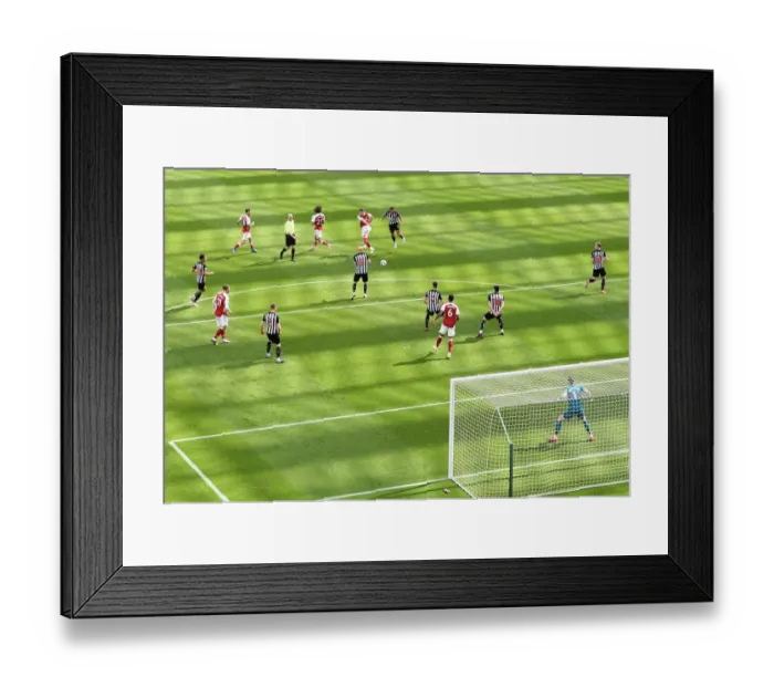 Framed Print : Granit Xhaka Shoots at Empty St. James Park: Newcastle United vs. Arsenal, Premier League 2021
