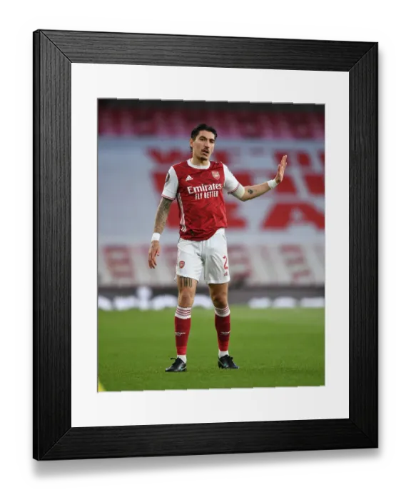 Framed Print : Arsenal's Hector Bellerin Alone in Empty Emirates Stadium: UEFA Europa League Semi-Final Against Villarreal Framed Print : Arsenal's Hector Bellerin Alone in Empty Emirates Stadium: UEFA Europa League Semi-Final Against Villarreal
