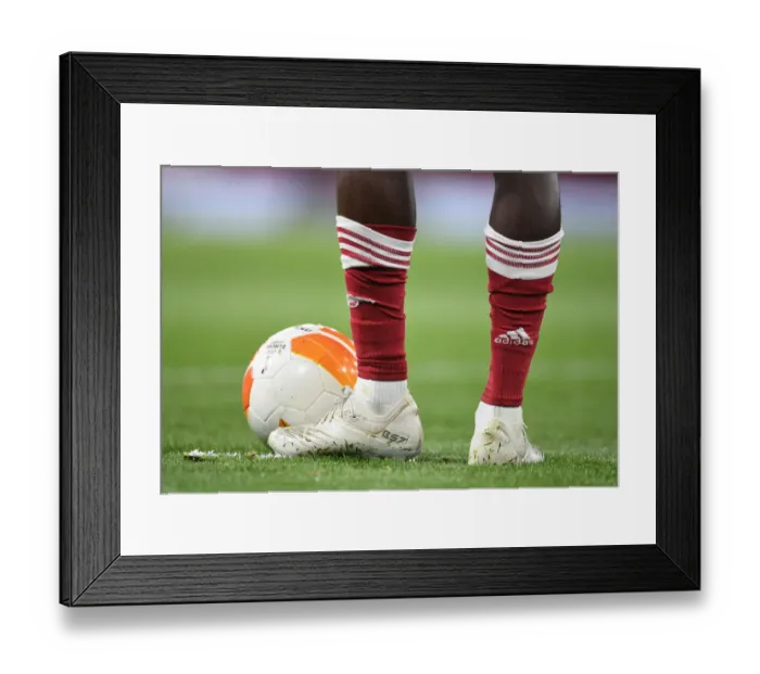 Framed Print : Bukayo Saka at Empty Emirates: Arsenal's Lone Warrior in UEFA Europa League Semi-Final Against Villarreal Framed Print : Bukayo Saka at Empty Emirates: Arsenal's Lone Warrior in UEFA Europa League Semi-Final Against Villarreal
