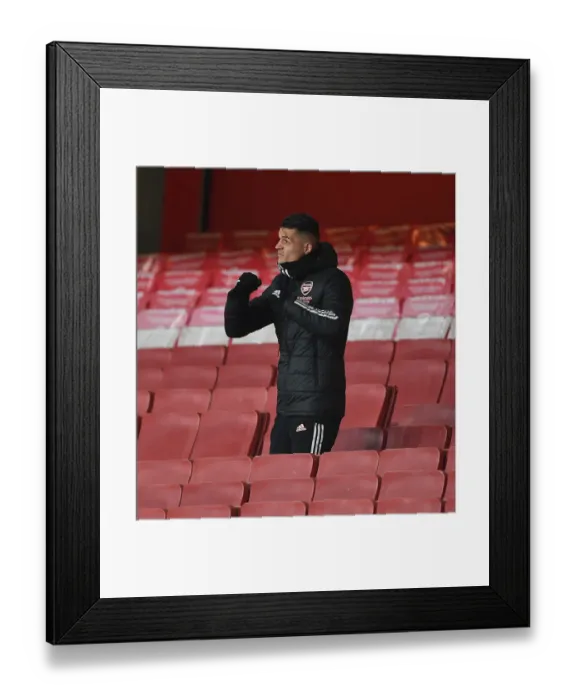 Framed Print : Arsenal's Xhaka Shines in Empty Emirates: Granit Xhaka Stars in UEFA Europa League Semi-Final Amid Pandemic Restrictions Framed Print : Arsenal's Xhaka Shines in Empty Emirates: Granit Xhaka Stars in UEFA Europa League Semi-Final Amid Pandemic Restrictions