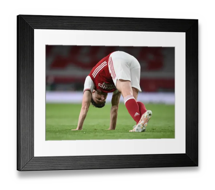 Framed Print : Arsenal's Kieran Tierney in UEFA Europa League Semi-Final: A Battle at Emirates Stadium Amidst Closed Doors Framed Print : Arsenal's Kieran Tierney in UEFA Europa League Semi-Final: A Battle at Emirates Stadium Amidst Closed Doors