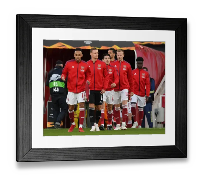 Framed Print : Arsenal Players Walk Out Before Empty Emirates Stadium for Europa League Semi-Final vs Villareal CF