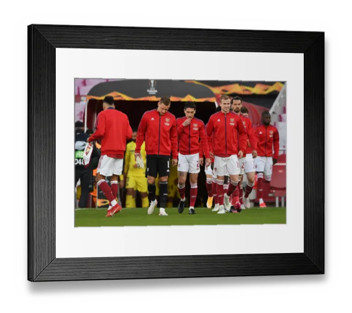 Framed Print : Arsenal Players Make Historic Europa League Semi-final Appearance at Empty Emirates Stadium Framed Print : Arsenal Players Make Historic Europa League Semi-final Appearance at Empty Emirates Stadium