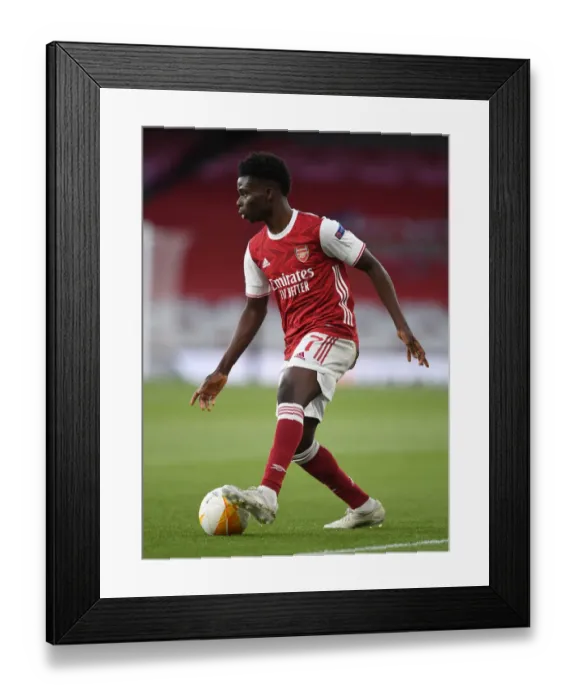 Framed Print : Arsenal's Bukayo Saka in UEFA Europa League Semi-Final: Arsenal vs Villarreal CF (Behind Closed Doors)