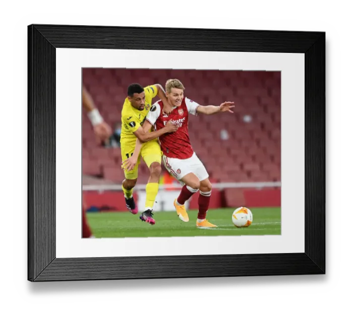 Framed Print : Martin Odegaard vs. Francis Coquelin: A Riveting Rivalry in Empty Emirates Stadium - Arsenal vs. Villarreal UEFA Europa League Semi-Final Framed Print : Martin Odegaard vs. Francis Coquelin: A Riveting Rivalry in Empty Emirates Stadium - Arsenal vs. Villarreal UEFA Europa League Semi-Final