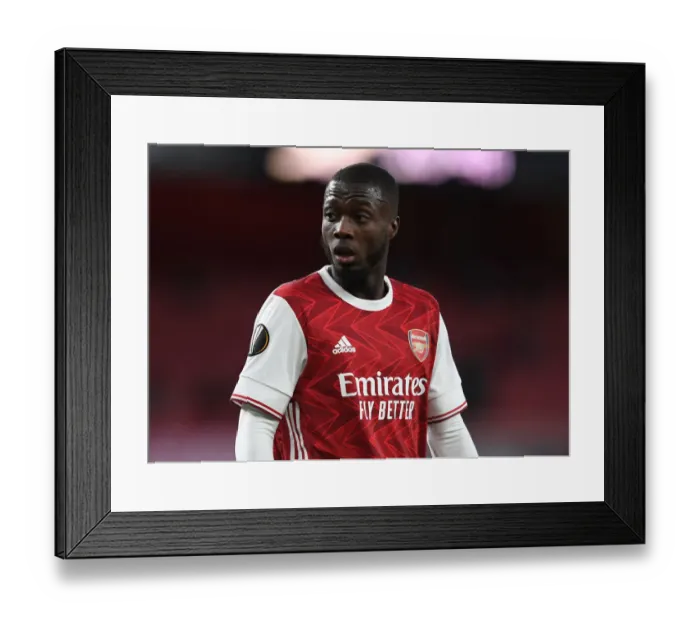 Framed Print : Arsenal's Nicolas Pepe in UEFA Europa League Semi-Final: Arsenal vs Villarreal CF (Behind Closed Doors)