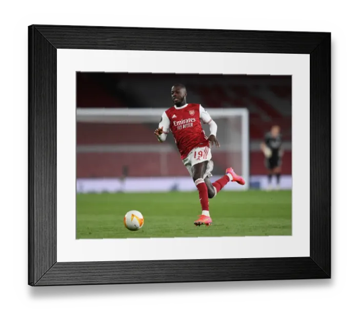 Framed Print : Arsenal's Nicolas Pepe in UEFA Europa League Semi-Final: Arsenal vs Villarreal CF (Behind Closed Doors)