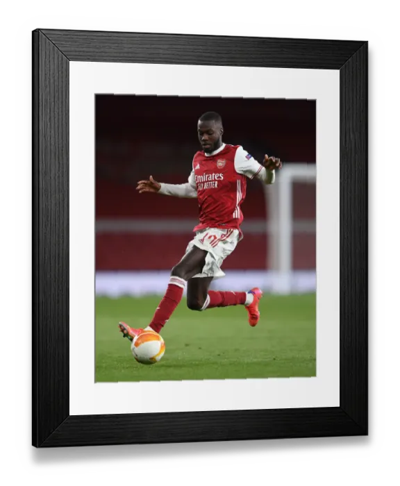 Framed Print : Arsenal's Nicolas Pepe in UEFA Europa League Semi-Final: Arsenal vs Villarreal CF (Behind Closed Doors) Framed Print : Arsenal's Nicolas Pepe in UEFA Europa League Semi-Final: Arsenal vs Villarreal CF (Behind Closed Doors)