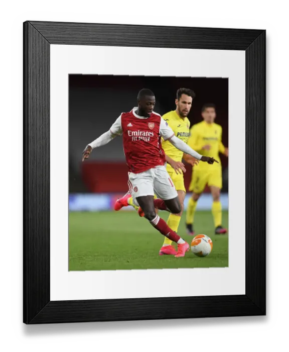 Framed Print : Arsenal vs Villarreal: Pepe vs Pedraza - UEFA Europa League Semi-Final Showdown in Empty Emirates Stadium Framed Print : Arsenal vs Villarreal: Pepe vs Pedraza - UEFA Europa League Semi-Final Showdown in Empty Emirates Stadium