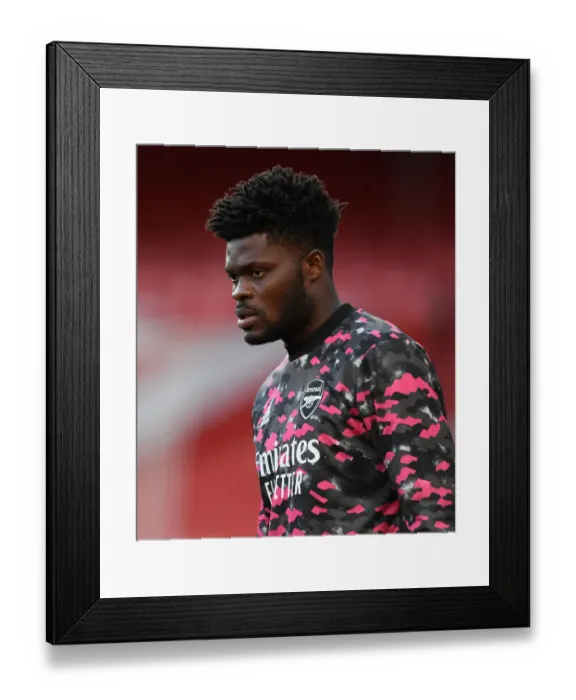 Framed Print : Arsenal's Thomas Partey Before Empty Emirates Stadium in UEFA Europa League Semi-Final vs Villarreal CF