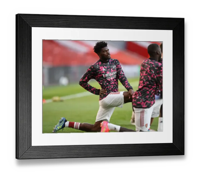 Framed Print : Thomas Partey's Silent Battle: Arsenal's Europa League Showdown vs Villarreal CF at Empty Emirates