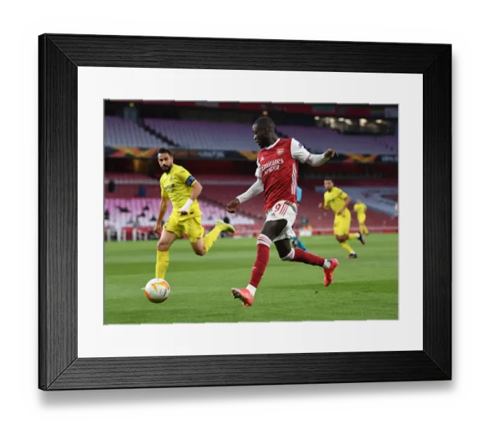 Framed Print : Arsenal's Nicolas Pepe in UEFA Europa League Semi-Final: Arsenal vs Villarreal CF (Behind Closed Doors) Framed Print : Arsenal's Nicolas Pepe in UEFA Europa League Semi-Final: Arsenal vs Villarreal CF (Behind Closed Doors)