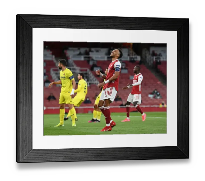 Framed Print : Arsenal's Aubameyang Fights for Europa League Victory Alone at Emptied Emirates Amidst Pandemic