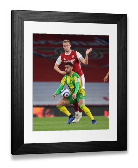 Framed Print : Arsenal vs. West Bromwich Albion: Rob Holding vs. Hal Robson-Kanu in Empty Emirates Stadium, Premier League Showdown (2020-21) Framed Print : Arsenal vs. West Bromwich Albion: Rob Holding vs. Hal Robson-Kanu in Empty Emirates Stadium, Premier League Showdown (2020-21)