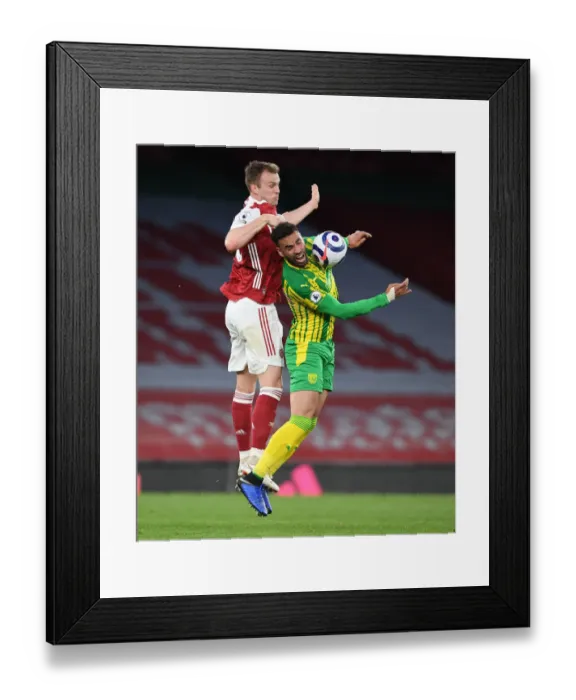 Framed Print : Clash of Titans: Rob Holding vs. Hal Robson-Kanu - A Battle in Empty Arsenal Grounds, Premier League 2021