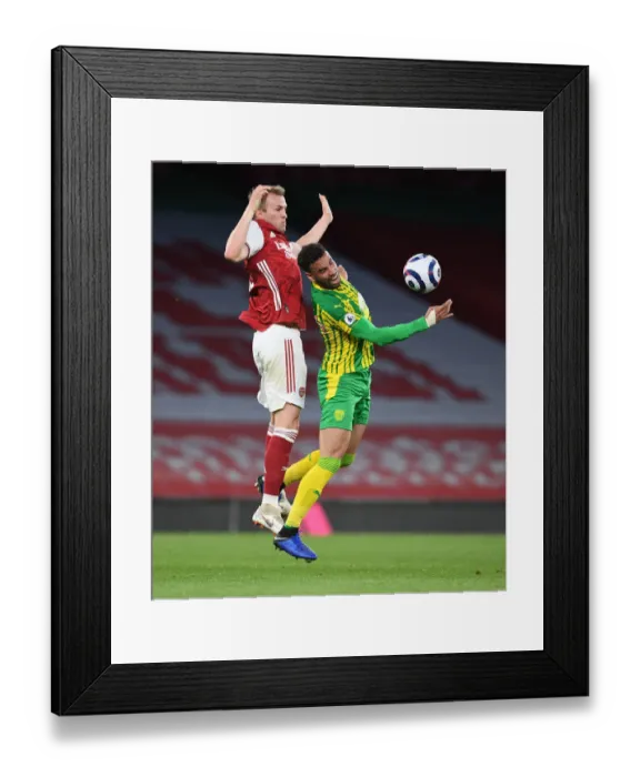 Framed Print : Clash of the Titans: Rob Holding vs. Hal Robson-Kanu - Arsenal vs. West Bromwich Albion in Empty Emirates Stadium, Premier League 2020-21 Framed Print : Clash of the Titans: Rob Holding vs. Hal Robson-Kanu - Arsenal vs. West Bromwich Albion in Empty Emirates Stadium, Premier League 2020-21