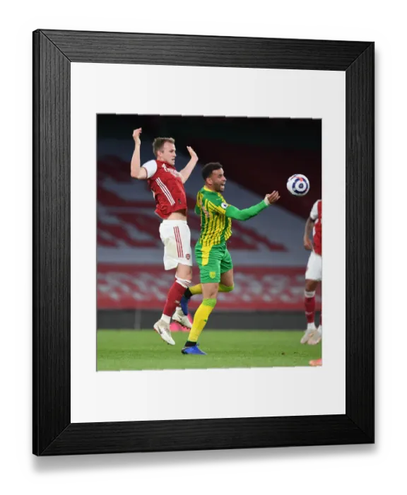 Framed Print : Clash of the Titans: Rob Holding vs. Hal Robson-Kanu - A Battle in Empty Emirates Stadium (Premier League 2021) Framed Print : Clash of the Titans: Rob Holding vs. Hal Robson-Kanu - A Battle in Empty Emirates Stadium (Premier League 2021)