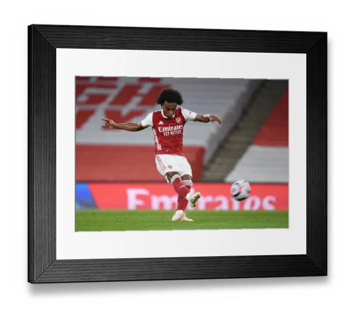 Framed Print : Arsenal's Willian Scores Third Goal Against West Bromwich Albion in Empty Emirates Stadium (2020-21) Framed Print : Arsenal's Willian Scores Third Goal Against West Bromwich Albion in Empty Emirates Stadium (2020-21)