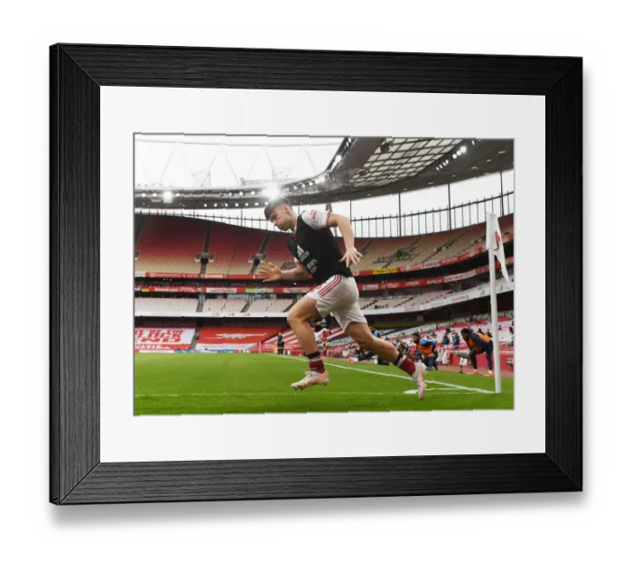 Framed Print : Arsenal's Kieran Tierney Warms Up Ahead of Emirates Showdown: Arsenal v West Bromwich Albion (2021-22 Premier League)