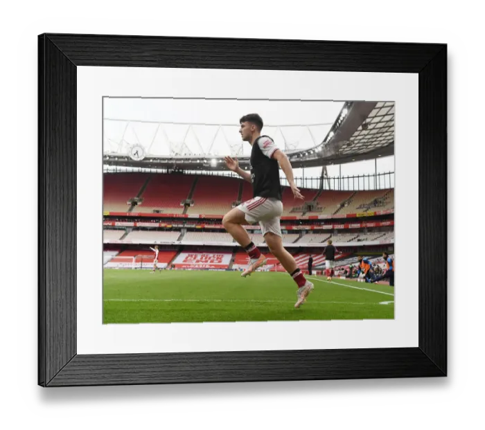 Framed Print : Arsenal's Kieran Tierney Prepares for Emirates Showdown: Arsenal vs. West Bromwich Albion (2021-22) - Behind Closed Doors