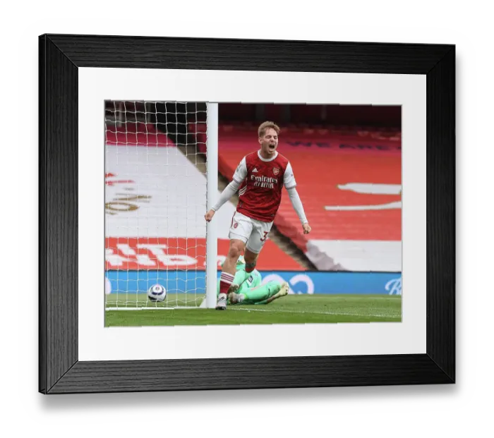 Framed Print : Emile Smith Rowe Scores the Winning Goal: Arsenal's Triumph in Empty Emirates Stadium Against West Bromwich Albion (2020-21)