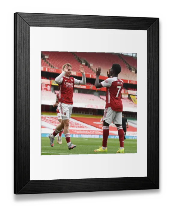 Framed Print : Arsenal's Smith Rowe and Saka Celebrate First Goal Against West Bromwich Albion in Empty Emirates Stadium (2020-21) Framed Print : Arsenal's Smith Rowe and Saka Celebrate First Goal Against West Bromwich Albion in Empty Emirates Stadium (2020-21)